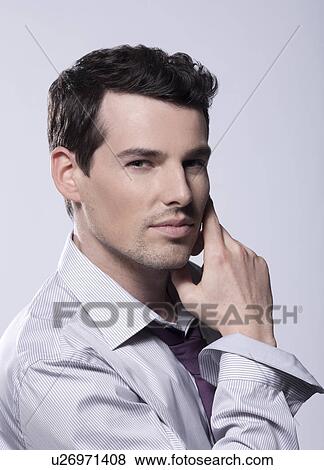 Stock Photo - Man in studio. Fotosearch