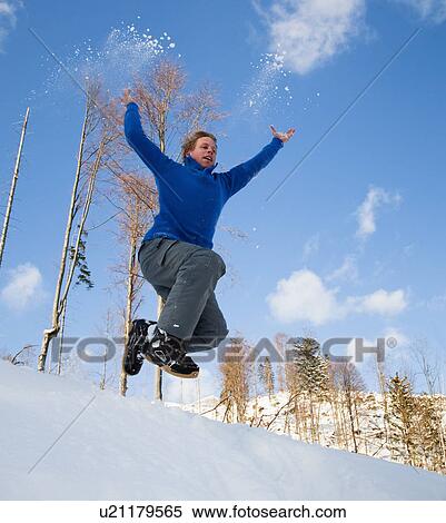 Man jumping into snow View Large Photo Image Stock Photography - Man jumping into snow. Fotosearch