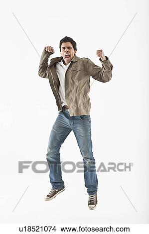 Man jumping on a white background View Large Photo Image Picture - Man jumping on a white background. Fotosearch