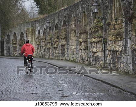 Stock Photograph - Man on bicicle. Fotosearch