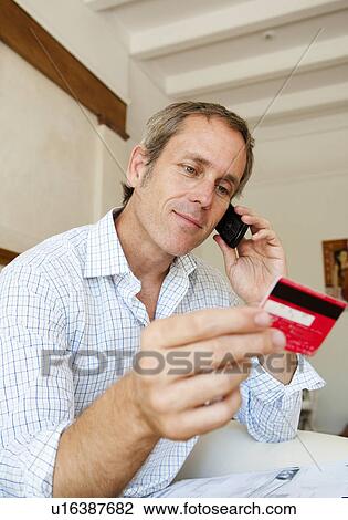 Man pays with credit card View Large Photo Image Stock Image - Man pays with credit card. Fotosearch