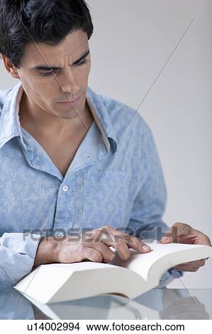 man Reading a book View Large Photo Image Picture - man Reading a book. Fotosearch