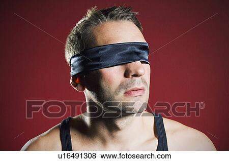 Stock Photo - man with blindfold. Fotosearch