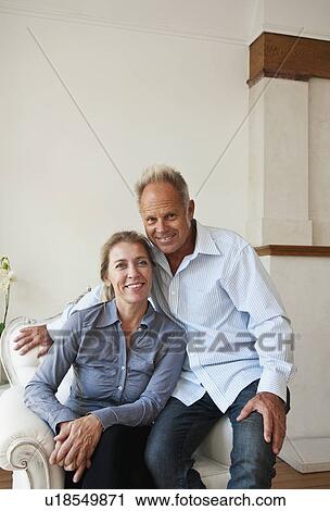 Middle aged couple at home View Large Photo Image Stock Image - Middle aged couple at home. Fotosearch