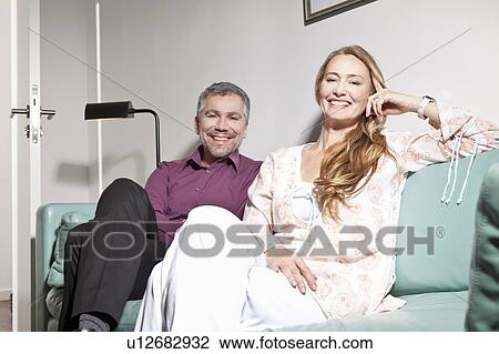 Middle aged man and woman smiling View Large Photo Image Stock Image - Middle aged man and woman smiling. Fotosearch