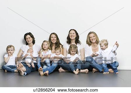 Picture - Mothers and children sitting together. Fotosearch