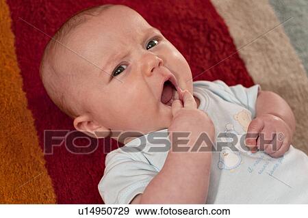 Newborn boy View Large Photo Image Stock Photo - Newborn boy. Fotosearch