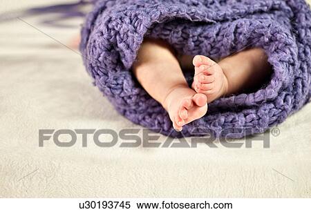 Stock Photography - Newborn feet. Fotosearch