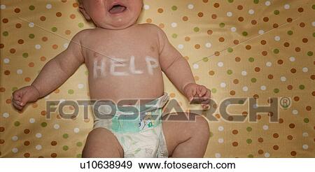 Stock Photo - Newborn with help write on chest. Fotosearch