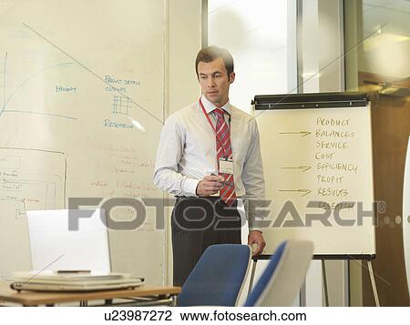 Office executive smiling View Large Photo Image Stock Image - Office executive smiling. Fotosearch