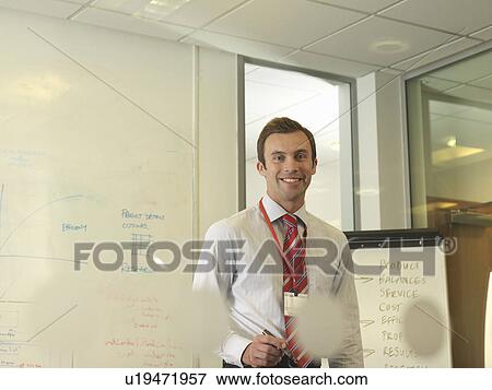 Stock Photo - Office executive smiling. Fotosearch