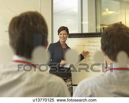 Stock Photography - Office meeting. Fotosearch