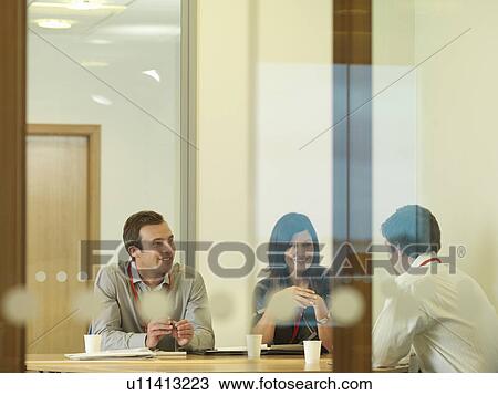 Office staff in meeting View Large Photo Image Stock Image - Office staff in meeting. Fotosearch
