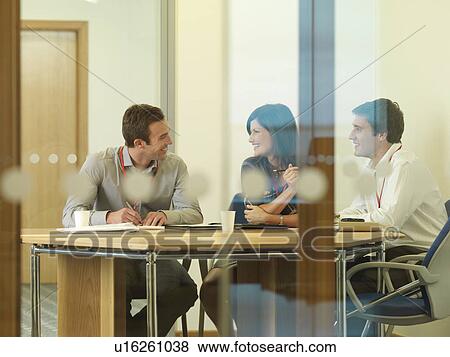 Office staff in meeting View Large Photo Image Stock Photo - Office staff in meeting. Fotosearch