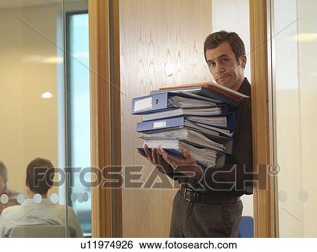 Office staff with files View Large Photo Image Stock Photograph - Office staff with files. Fotosearch