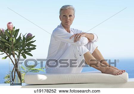 Older woman doing yoga View Large Photo Image Stock Image - Older woman doing yoga. Fotosearch