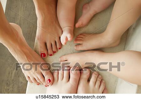 Stock Image - Overhead view of feet. Fotosearch
