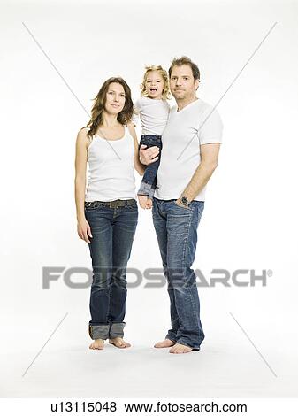 Parents holding daughter View Large Photo Image Stock Photo - Parents holding daughter. Fotosearch