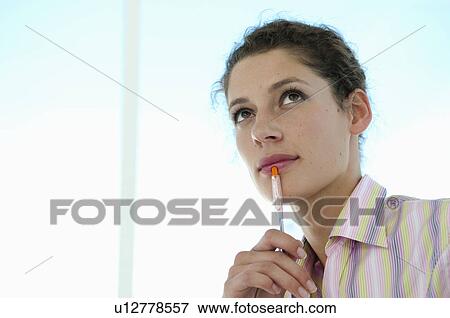 Pensive business woman View Large Photo Image Stock Photo - Pensive business woman. Fotosearch