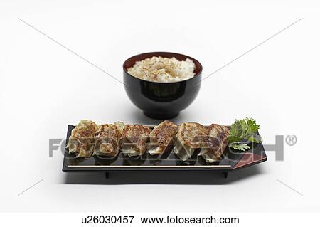 Stock Photo - Plate and bowl of Japanese food. Fotosearch