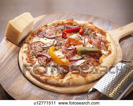 Plate of artisan pizza in restaurant View Large Photo Image Stock Image - Plate of artisan pizza in restaurant. Fotosearch