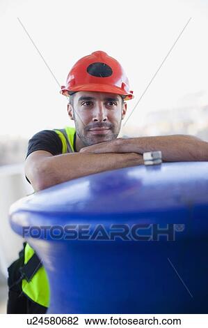 Stock Image - Portrait of a builder. Fotosearch