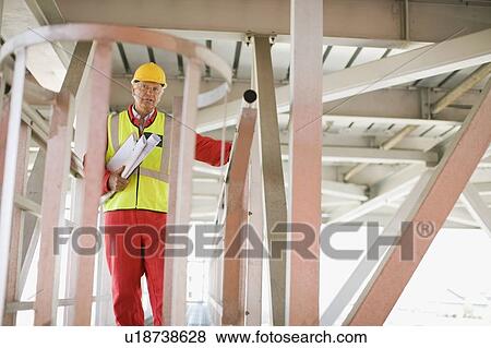 Stock Photo - Portrait of a builder. Fotosearch