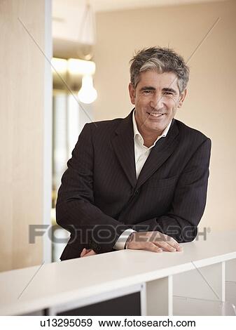 Stock Photo - Portrait of a business man. Fotosearch