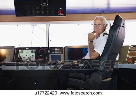 Portrait of a captain View Large Photo Image Stock Image - Portrait of a captain. Fotosearch