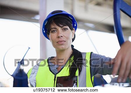Portrait of a female builder View Large Photo Image Stock Image - Portrait of a female builder. Fotosearch