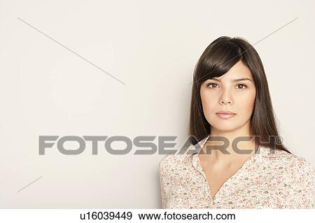 Stock Photo - Portrait of a youg woman. Fotosearch