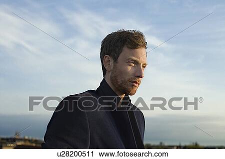 Portrait of a young man View Large Photo Image Stock Image - Portrait of a young man. Fotosearch