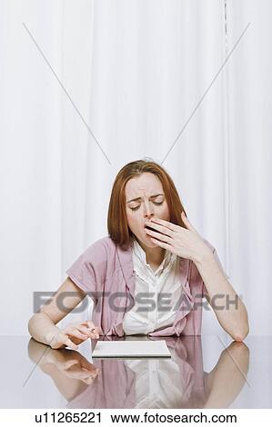 Stock Image - Portrait of a young woman. Fotosearch