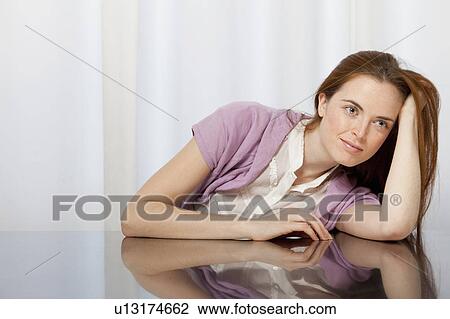 Portrait of a young woman View Large Photo Image Stock Image - Portrait of a young woman. Fotosearch