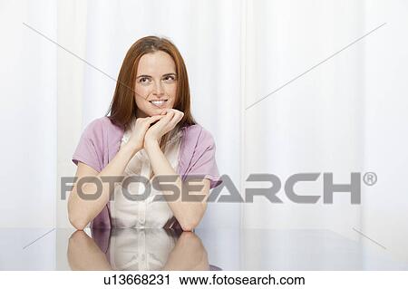 Portrait of a young woman View Large Photo Image Stock Image - Portrait of a young woman. Fotosearch