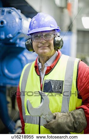Stock Photography - Portrait of an industrial worker. Fotosearch