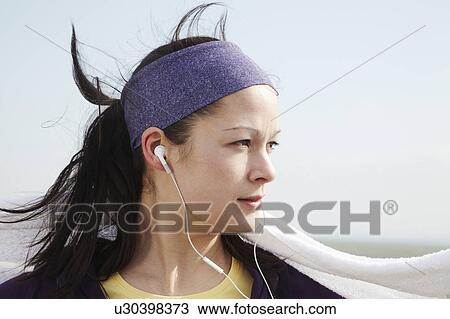 Portrait of woman after exercise outside View Large Photo Image Stock Image - Portrait of woman after exercise outside. Fotosearch