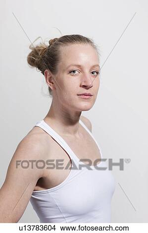Portrait of woman in white tanktop View Large Photo Image Picture - Portrait of woman in white tanktop. Fotosearch