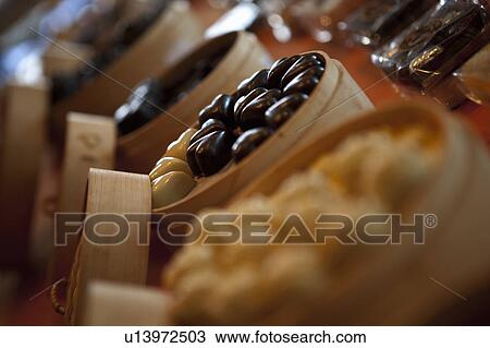 Stock Image - Pralines on a table. Fotosearch