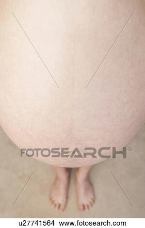 Pregnancy bump, close up View Large Photo Image Picture - Pregnancy bump, close up. Fotosearch