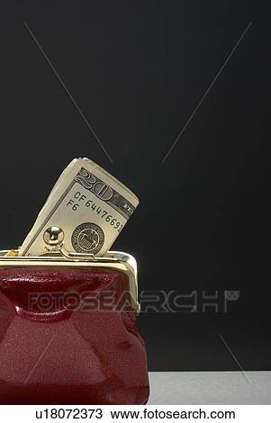 Purse with dollars in it View Large Photo Image Stock Image - Purse with dollars in it. Fotosearch