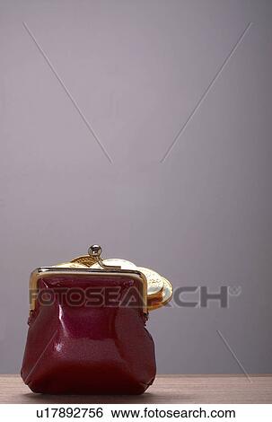 Purse with gold euros in it View Large Photo Image Stock Photograph - Purse with gold euros in it. Fotosearch