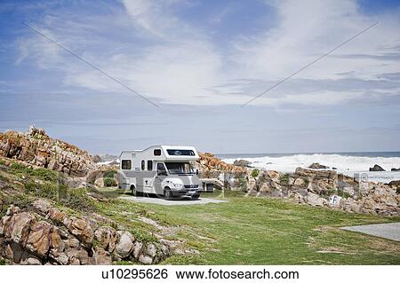 Recreational vehicle parked on beach View Large Photo Image Stock Photograph - Recreational vehicle parked on beach. Fotosearch
