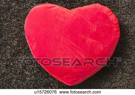 red cushion with a heart shape View Large Photo Image Stock Photograph - red cushion with a heart shape. Fotosearch