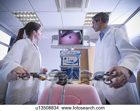 Scientists practice with simulator View Large Photo Image Picture - Scientists practice with simulator. Fotosearch