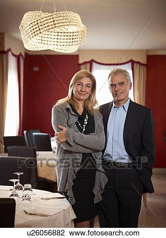 Senior Business Couple in restaurant View Large Photo Image Stock Image - Senior Business Couple in restaurant. Fotosearch