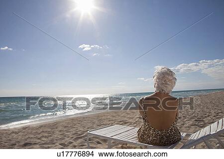 Senior Woman on the beach View Large Photo Image Picture - Senior Woman on the beach. Fotosearch