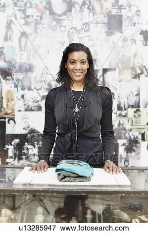 Stock Photo - Shop assistant. Fotosearch