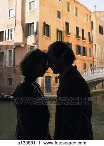 Silhouette of a couple View Large Photo Image Stock Image - Silhouette of a couple. Fotosearch