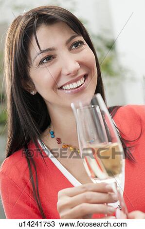 Smiling woman drinking glass of wine View Large Photo Image Stock Image - Smiling woman drinking glass of wine. Fotosearch